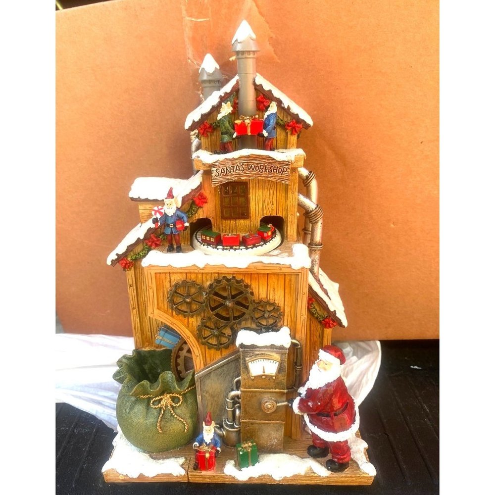 Román The Animated musical Rotating Santa's Workshop by Roman Hand-sculpture